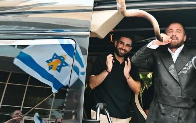 Released hostage Segev Kalfon leaves Kfar Maccabiah Hotel in Ramat Gan, on his way home to Dimona, on October 26, 2025 (Paulina Patimer/Hostages Forum) Released hostage Segev Kalfon leaves Kfar Maccabiah Hotel in Ramat Gan, on his way home to Dimona, on October 26, 2025 (Paulina Patimer/Hostages Forum)