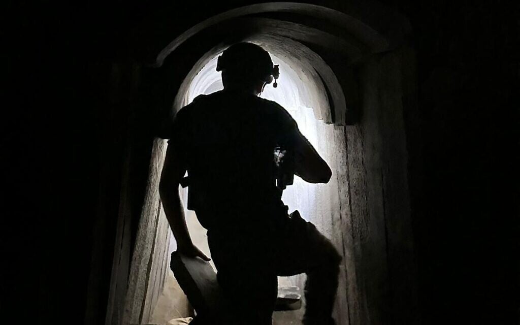 A combat engineer of the elite Yahalom unit inside a major Hamas tunnel in southern Gaza, where the IDF says the body of Lt. Hadar Goldin had been held by the terror group in recent years, November 20, 2025. (Israel Defense Forces)