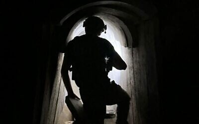 A combat engineer of the elite Yahalom unit inside a major Hamas tunnel in southern Gaza, where the IDF says the body of Lt. Hadar Goldin had been held by the terror group in recent years, November 20, 2025. (Israel Defense Forces)