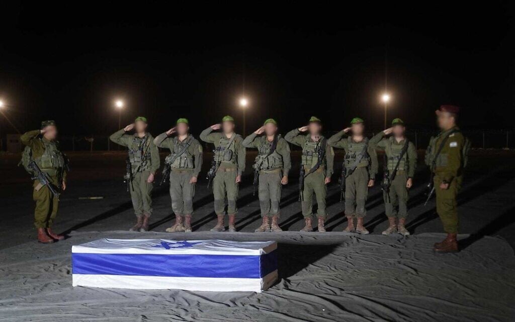 IDF troops salute the casket containing the body of Dror Or after it was returned by the Palestinian terror groups on November 25, 2025. (Israel Defense Forces)