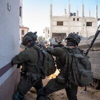 IDF troops operate on the eastern side of the Yellow Line in southern Gaza's Khan Younis, in a handout photo issued on November 9, 2025. (Israel Defense Forces)