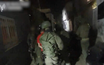 IDF troops detain members of an alleged Hamas network in the Bethlehem area of the West Bank, in footage issued by the military on November 13, 2025. (Israel Defense Forces)