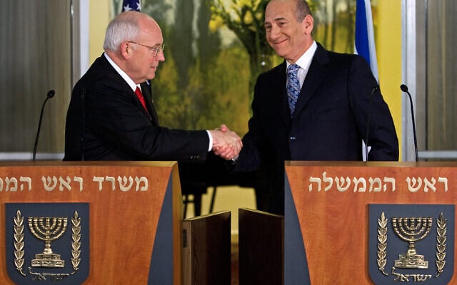Then-US vice president Dick Cheney (L) and prime minister Ehud Olmert shake hands after delivering statements on March 22, 2008, from inside the prime minister's residence in Jerusalem. (Paul J. Richards/AFP) Then-US vice president Dick Cheney (L) and prime minister Ehud Olmert shake hands after delivering statements on March 22, 2008, from inside the prime minister's residence in Jerusalem. (Paul J. Richards/AFP)
