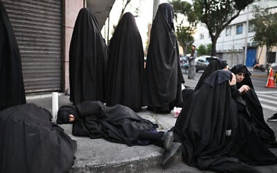 Illustrative: Members of the Lev Tahor Jewish sect attend a protest outside the Alida Espana de Arana special education school where their children were taken by authorities in Guatemala City on January 15, 2025. (Johan ORDONEZ / AFP)