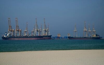 Illustrative: Tankers are seen at the Khor Fakkan Container Terminal, the only natural deep-sea port in the region and one of the major container ports in the Sharjah Emirate, along the Strait of Hormuz, a waterway through which one-fifth of global oil output passes on June 23, 2025. (Giuseppe CACACE / AFP) Illustrative: Tankers are seen at the Khor Fakkan Container Terminal, the only natural deep-sea port in the region and one of the major container ports in the Sharjah Emirate, along the Strait of Hormuz, a waterway through which one-fifth of global oil output passes on June 23, 2025. (Giuseppe CACACE / AFP)