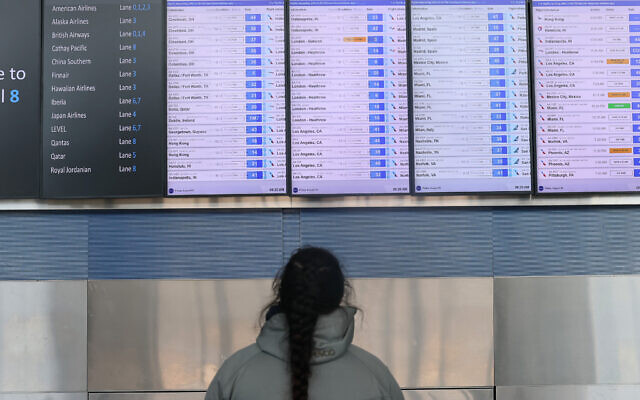 A person looks at a flight schedule screen in Terminal 8 at JFK Airport on August 29, 2025 in New York, New York (Michael M. Santiago / GETTY IMAGES NORTH AMERICA / Getty Images via AFP) A person looks at a flight schedule screen in Terminal 8 at JFK Airport on August 29, 2025 in New York, New York (Michael M. Santiago / GETTY IMAGES NORTH AMERICA / Getty Images via AFP)