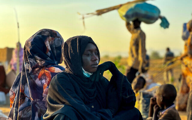 A displaced woman rests in Tawila, in Sudan's war-torn western Darfur region, on October 28, 2025, after fleeing El Fasher following the city's fall to the Rapid Support Forces (RSF). (Photo by AFP) A displaced woman rests in Tawila, in Sudan's war-torn western Darfur region, on October 28, 2025, after fleeing El Fasher following the city's fall to the Rapid Support Forces (RSF). (Photo by AFP)