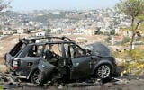 Illustrative: The wreckage of a vehicle is left strewn on the side of the road, a day after an Israeli airstrike that killed its occupants, in the southern Lebanese village of Kfar Roummane, in the Nabatieh district on November 2, 2025. (MAHMOUD ZAYYAT / AFP)