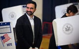 Democratic Mayoral candidate Zohran Mamdani reacts as his wife, Rama Duwaji, votes at The Frank Sinatra School of the Arts on November 4, 2025, in Queens, New York City. (Alexi J. Rosenfeld / GETTY IMAGES NORTH AMERICA / Getty Images via AFP)
