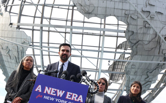 New York City mayor-elect Zohran Mamdani, alongside his mayoral transition team, speaks during a news conference at Flushing Meadows Corona Park in the Queens borough of New York City on November 5, 2025. (Timothy A. Clary/AFP) New York City mayor-elect Zohran Mamdani, alongside his mayoral transition team, speaks during a news conference at Flushing Meadows Corona Park in the Queens borough of New York City on November 5, 2025. (Timothy A. Clary/AFP)