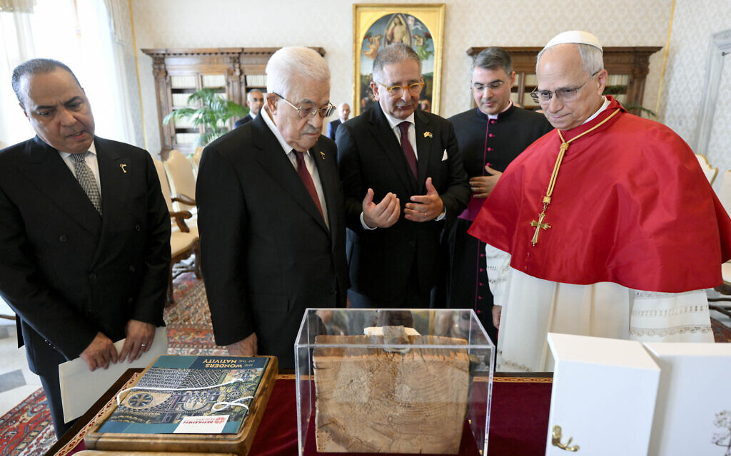 This photo taken and handed out on November 6, 2025 by The Vatican Media shows Pope Leo XIV during a meeting with Palestinian Authority President Mahmoud Abbas in The Vatican. (Handout / VATICAN MEDIA / AFP)