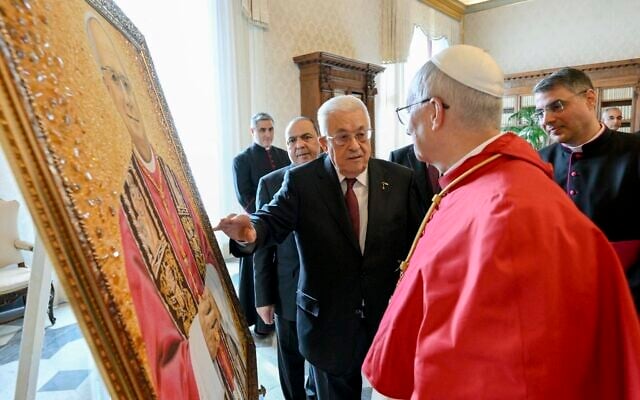 This photo taken and handout on November 6, 2025 by The Vatican Media shows Pope Leo XIV during a meeting with Palestinian President Mahmud Abbas in The Vatican. (Photo by Handout / VATICAN MEDIA / AFP)