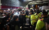 Police officers clash with people trying to enter Villa Park in Birmingham, central England, on November 6, 2025, for the UEFA Europa League league-stage football match between Aston Villa and Maccabi Tel Aviv as anti-Israel demonstrators gather outside. (HENRY NICHOLLS / AFP)