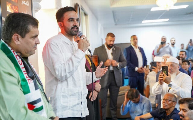 New York City Mayor elect Zohran Mamdani in white shirt, speaks to members of the Centro Islamico del Caribe -Masjid Ebadur Rahman mosque, San Juan, Puerto Rico, on November 7, 2025. (Angel Valentin / GETTY IMAGES NORTH AMERICA / Getty Images via AFP)