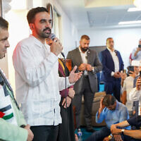 New York City Mayor-elect Zohran Mamdani, in white shirt, speaks to members of the Centro Islamico del Caribe - Masjid Ebadur Rahman mosque in prayer, on November 7, 2025 in San Juan, Puerto Rico. (Angel Valentin / Getty Images via AFP)