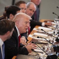 US President Donald Trump, joined by lawmakers and members of his administration, delivers remarks during a dinner with leaders of Central Asian countries in the East Room of the White House on November 6, 2025, in Washington, DC. (Photo by Andrew Harnik / GETTY IMAGES NORTH AMERICA / Getty Images via AFP)