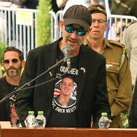 Ronen Neutra speaks at the funeral of his son Captain Omer Neutra, a tank platoon commander who was killed battling invading Hamas terrorists on October 7, 2023, and his body abducted to Gaza, at the Kiryat Shaul Military Cemetery, in Tel Aviv, on November 7, 2025. (Jack GUEZ / AFP)