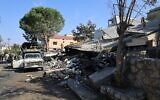 Workers remove the rubble from the a site targeted overnight by an Israeli airstrike in the southern Lebanese village of Et Taybeh on November 7, 2025.  (Photo by Rabih DAHER / AFP)
