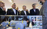 This handout photo released by the Atomic Energy Organization of Iran (AEOI) on November 10, 2025 shows Iran's Foreign Minister Abbas Araghchi during a visit to a facility in Tehran. (Atomic Energy Organization of Iran / AFP)