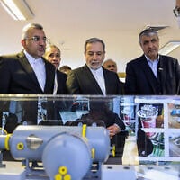 This handout photo released by the Atomic Energy Organization of Iran (AEOI) on November 10, 2025 shows Iran's Foreign Minister Abbas Araghchi during a visit to a facility in Tehran. (Atomic Energy Organization of Iran / AFP)