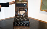 An Enigma M4 rotor key machine used for encrypted communication during World War II, ahead of its auction exhibited at the Christie's auction house in Paris, France, on November 13, 2025. (BERTRAND GUAY / AFP)