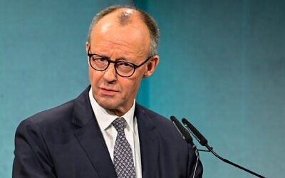 German Chancellor Friedrich Merz delivers the opening speech at an economic summit hosted by German newspaper Süddeutsche Zeitung at the Adlon Hotel in Berlin, November 17, 2025. (Tobias Schwarz/AFP)