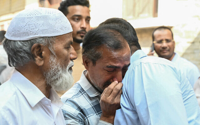 Relatives of victims, who were killed in a bus accident near the holy city of Medina, mourn in Hyderabad on November 17, 2025. (Noah SEELAM / AFP) Relatives of victims, who were killed in a bus accident near the holy city of Medina, mourn in Hyderabad on November 17, 2025. (Noah SEELAM / AFP)