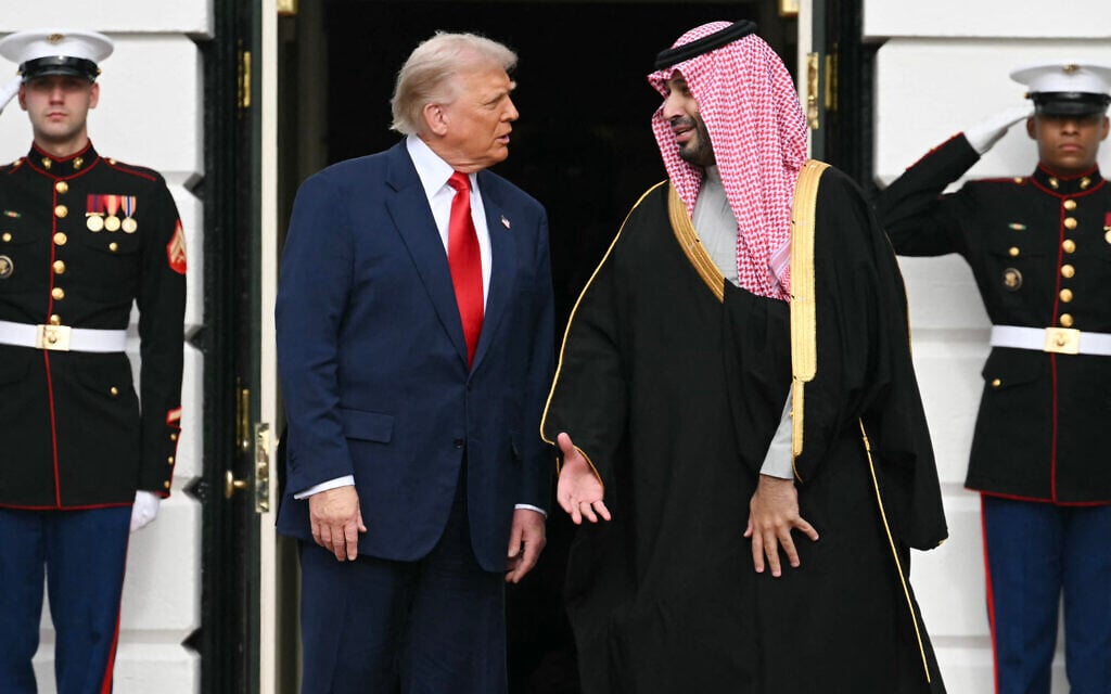 US President Donald Trump greets Crown Prince of Saudi Arabia Mohammed bin Salman on the South Lawn at the White House in Washington, DC on November 18, 2025. (SAUL LOEB / AFP)