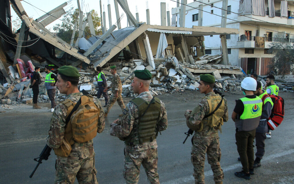 Illustrative: Lebanese army soldiers secure the site of an Israeli airstrike that targeted a building in the southern Lebanese village of Deir Kifa on November 19, 2025. (Mahmoud Zayyat/AFP)