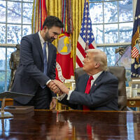 US President Donald Trump (R) shakes hands with New York Mayor-elect Zohran Mamdani as they meet in the Oval Office of the White House in Washington, DC, on November 21, 2025. (Photo by Jim WATSON / AFP)