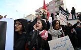 Tunisians demonstrate against their president's regime in Tunis on November 22, 2025. (Fethi Belaid / AFP)