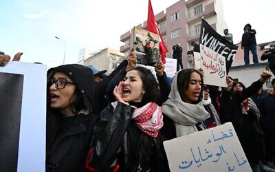 Tunisians demonstrate against their president's regime in Tunis on November 22, 2025. (Fethi Belaid / AFP)
