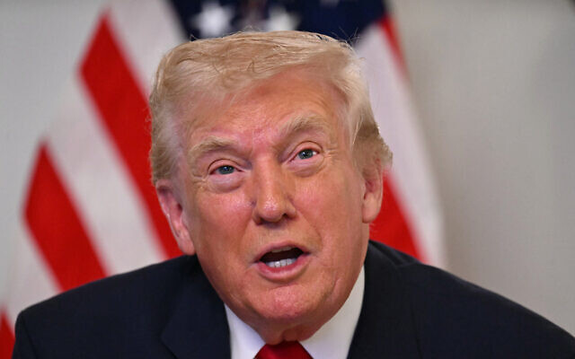 US President Donald Trump participates in a video call with military service members from his Mar-a-Lago residence in Palm Beach, Florida, on November 27, 2025. (Jim WATSON / AFP) US President Donald Trump participates in a video call with military service members from his Mar-a-Lago residence in Palm Beach, Florida, on November 27, 2025. (Jim WATSON / AFP)