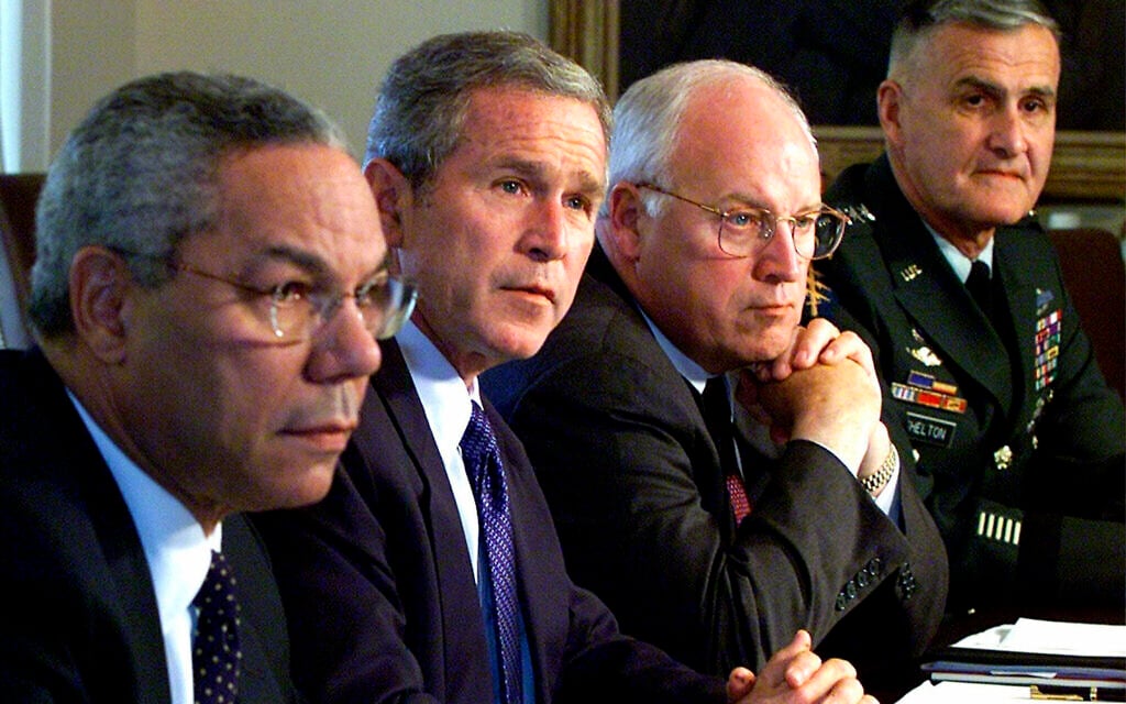 From left, Secretary of State Colin Powell, President George W. Bush, Vice President Dick Cheney and Chairman of the Joint Chiefs of Staff Gen. Henry Shelton attend a meeting with the National Security Council in the Cabinet Room of the White House, September 12, 2001. (AP Photo/Doug Mills, File)