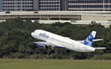 A JetBlue Airways Airbus A320-232 takes off from the Tampa International Airport in Tampa, Florida, May 15, 2014 (AP Photo/Chris O'Meara, File)