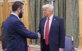 US President Donald Trump, right, shakes hands with Syria's interim President Ahmad al-Sharaa, in Riyadh, Saudi Arabia, May 14, 2025. (Bandar Aljaloud/Saudi Royal Palace via AP)