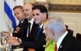 Prime Minister Benjamin Netanyahu, from right, attends a meeting with US President Donald Trump, not pictured, as Netanyahu's wife Sara Netanyahu, Strategic Affairs Minister Ron Dermer, National Security Adviser Tzachi Hanegbi and Cabinet Secretary Yossi Fuchs listen, in the Blue Room of the White House, July 7, 2025, in Washington. (AP/Alex Brandon)