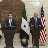 US Ambassador to Turkey and Special Envoy to Syria Tom Barrack and Syrian Foreign Minister Asaad al-Shibani in Damascus, Syria, September 16, 2025. (AP Photo/Ghaith Alsayed)
