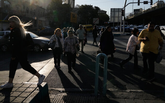 People cross an intersection in northern Tehran, Iran, September 28, 2025. (AP/ Vahid Salemi) People cross an intersection in northern Tehran, Iran, September 28, 2025. (AP/ Vahid Salemi)