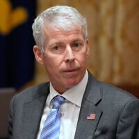 US Energy Secretary Chris Wright listens as US President Donald Trump meets with Argentina's President Javier Milei in the Cabinet Room of the White House in Washington, October 14, 2025. (AP Photo/ Alex Brandon)