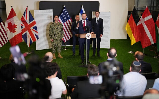 US Vice President JD Vance speaks to the media as US Special Envoy to the Middle East Steve Witkoff and Jared Kushner stand next to him, in Kiryat Gat, Israel, October 21, 2025. (AP Photo/Francisco Seco)