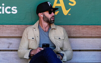 Miami Marlins assistant general manager Gabe Kapler sits in the dugout before the team's baseball game against the Oakland Athletics, May 3, 2024, in Oakland, California. (AP/Godofredo A. Vásquez, File)