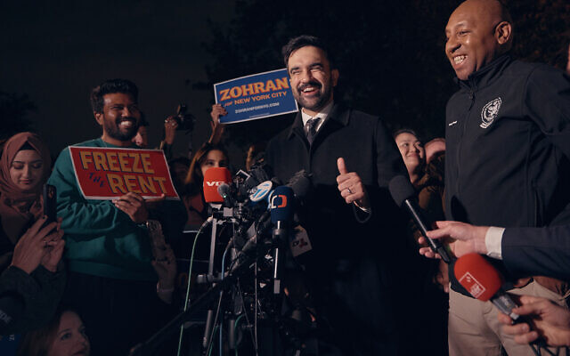 New York mayoral candidate Zohran Mamdani reacts during a press conference at the Dutch Kills Playground in the Queens borough of New York, November 3, 2025. (AP Photo/Andres Kudacki)