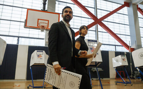 New York mayoral candidate Zohran Mamdani and his wife Rama Sawaf Duwaji vote on Election Day, November 4, 2025, in New York. (AP Photo/Olga Fedorova)