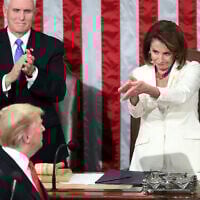 US President Donald Trump turns to House speaker Nancy Pelosi of Calif., as he delivers his State of the Union address to a joint session of Congress on Capitol Hill in Washington, as US Vice President Mike Pence watches, February 5, 2019. (AP Photo/Andrew Harnik File)