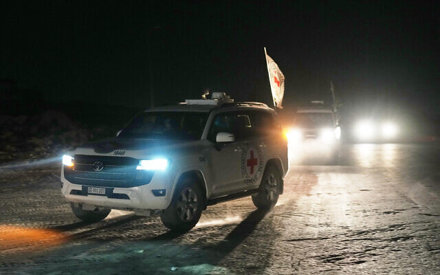 A Red Cross convoy carrying the body of a deceased hostage handed over by Palestinians terrorists makes its way toward the border crossing with Israel, to be transferred to Israeli authorities, in Deir al-Balah, central Gaza Strip, November 7, 2025. (AP Photo/Abdel Kareem Hana)