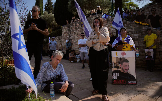 Mourners attend the funeral of slain IDF officer and hostage Itay Chen at Kiryat Shaul Military Cemetery in Tel Aviv, November 9, 2025. (AP Photo/Ohad Zwigenberg)