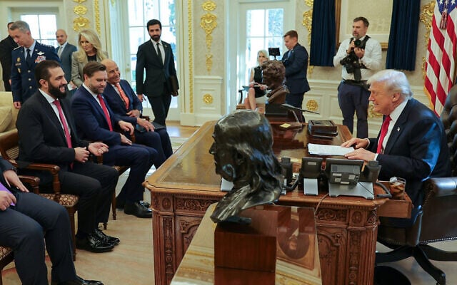 In this photo released by Syrian Presidency Press Office, US President Donald Trump, right, meets with Syria's President Ahmad al-Sharaa, first left, at the White House in Washington, November 10, 2025. (Syrian Presidency Press Office via AP) In this photo released by Syrian Presidency Press Office, US President Donald Trump, right, meets with Syria's President Ahmad al-Sharaa, first left, at the White House in Washington, November 10, 2025. (Syrian Presidency Press Office via AP)