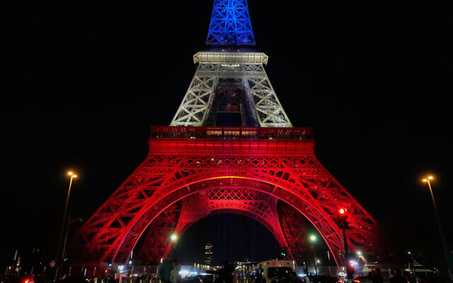 The Eiffel Tower is lit in the colors of the French national flag in Paris, November 12, 2025, to honor the victims of the terror attacks at the Bataclan concert hall, cafes, and the national stadium 10 years ago. (AP Photo/Michel Euler) The Eiffel Tower is lit in the colors of the French national flag in Paris, November 12, 2025, to honor the victims of the terror attacks at the Bataclan concert hall, cafes, and the national stadium 10 years ago. (AP Photo/Michel Euler)