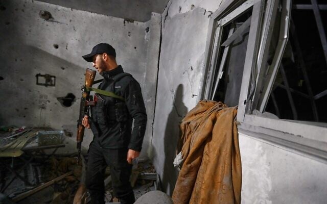 A Syrian Internal Security Forces officer inspects a home in Damascus, Syria, Nov. 14, 2025, after it was hit by rockets, according to state media (AP Photo/Omar Sanadiki) A Syrian Internal Security Forces officer inspects a home in Damascus, Syria, Nov. 14, 2025, after it was hit by rockets, according to state media (AP Photo/Omar Sanadiki)